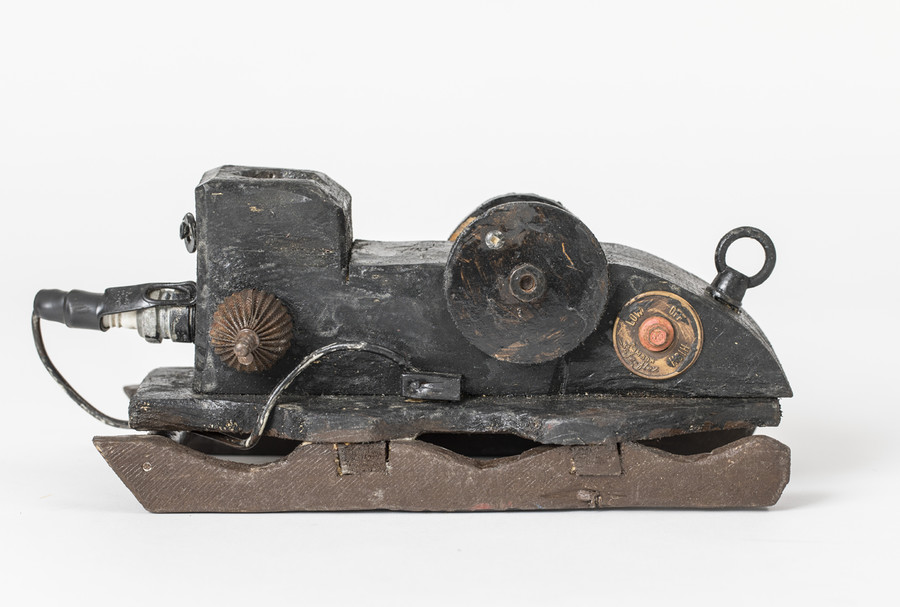 O.T. (Snowmobile) Holzplastik, farbig gefasst, Metall, Kunststoff